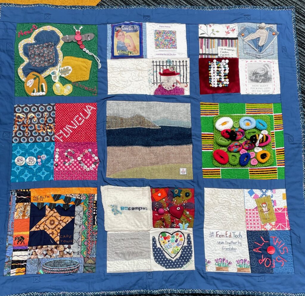 Image of quilt with varied, colourful squares
