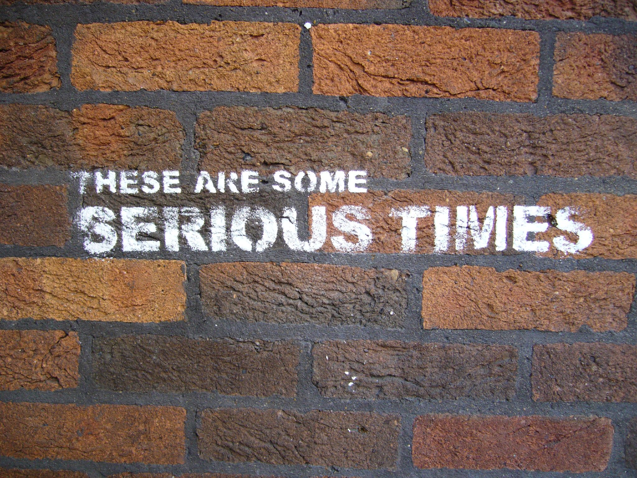 Graffiti on wall: These are some serious times